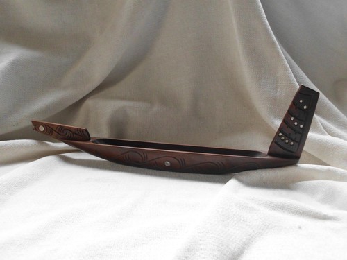 Maori new zealand hand - hand, carved